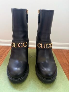 Gucci Black Leather Ankle Boots with Gold Logo Strap